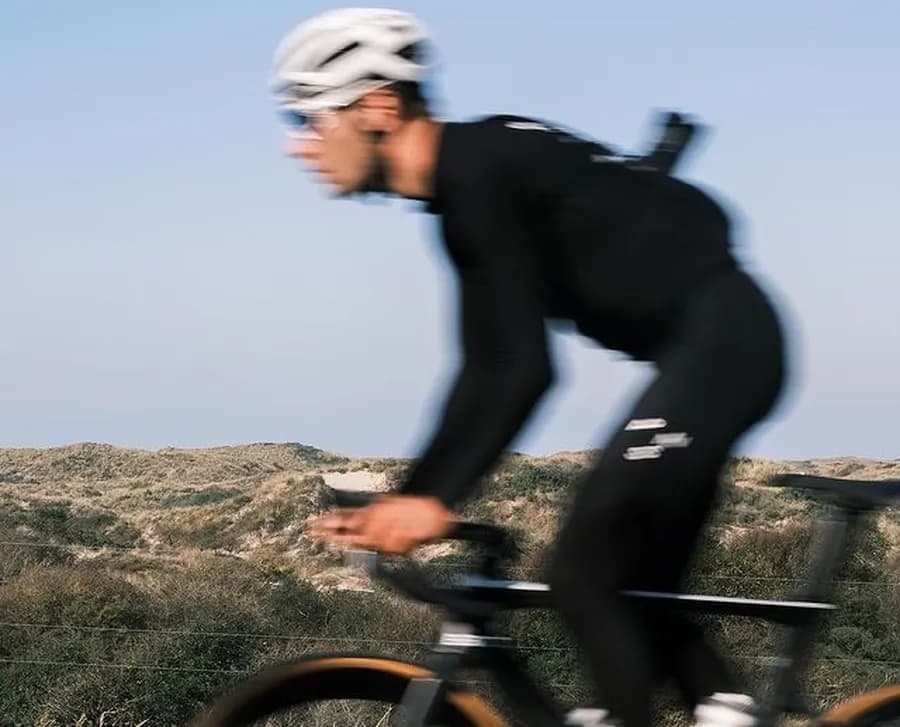 Athlete cycling outdoors